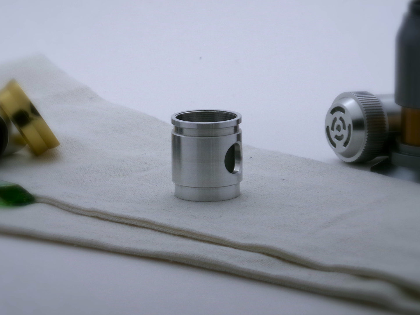 Aluminum female/female threaded switch section formatted VHC lightsabers; standing proud, face side view.
