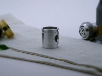 Aluminum female/female threaded switch section formatted VHC lightsabers; standing proud, face side view.